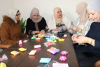 Palestine Polytechnic University (PPU) - طلبة العلاج الوظيفي في بوليتكنك فلسطين ينظمون ورشة توعوية لدعم الناجيات من سرطان الثدي بالشراكة مع مؤسسة لَنا: «لَنْ نَسْتَسْلِمَ أَبَدًا» في بيت لحم